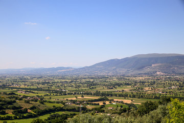 Fototapeta na wymiar umbrian landscape, subasio mountain, hills and wineyards