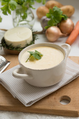 Cheese soup with yellow and white cheese, cream, onions and potatoes. Healthy Vegetarian Food