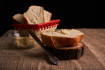breads and butter concept of teasty home food close up on table