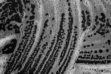 Abstract background white soapy foam texture. Shampoo foam with bubbles