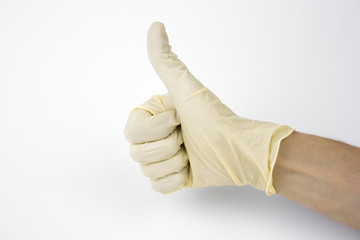 medical protective latex gloves on male hand on white background
