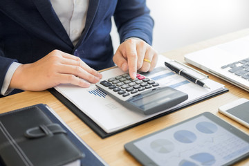 Businessman work on Desk office business financial analysis charts or graphs accounting ...