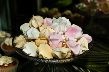 stack of zephyrs in glass vase