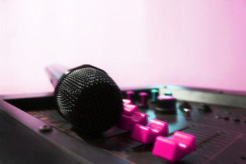 Fototapeta na wymiar sound music mixer control panel And a microphone