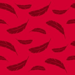  Feathers of birds in flight. Feather seamless pattern on red background.