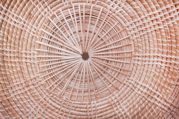 Wood  handcraft  rattan weave in circle seanless patterns , natural  texture abstract for brown crafts background