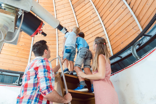 Family visiting the public star observatory
