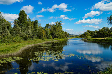 Fototapeta na wymiar Samara, region, river, Volga, mountains, ditches, water, reflection, shore, blue, sky, white, clouds, shore, sand, forest, trees, nature, walk