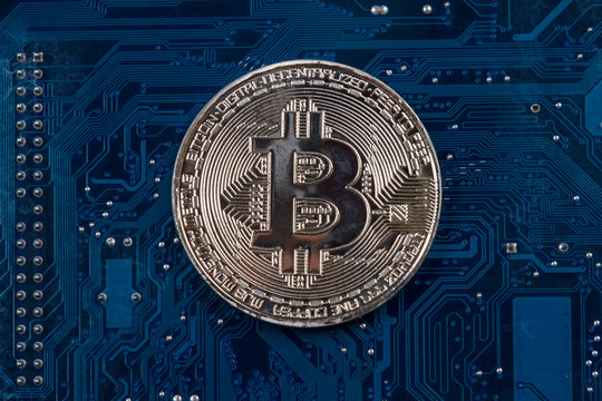 Coin Bitcoin on the motherboard