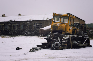 Broken bulldozer in a Siberian outback. Destruction. Broken machine. Abandoned