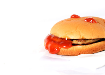 Close up of Hamburger meal with tomato sauce on white backgrounds