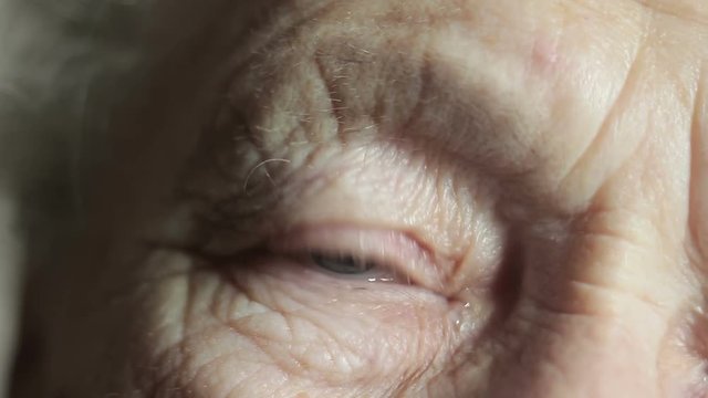 The eye of a very old woman, close-up