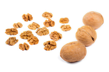 Walnuts and kernels isolated on white background