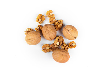 Walnuts and kernels isolated on white background
