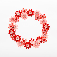 Happy Mother's Day, Women's Day, Valentine's Day or Birthday Living Coral Pantone Color Background. Coral flat lay greeting card template with beautiful fake flowers.