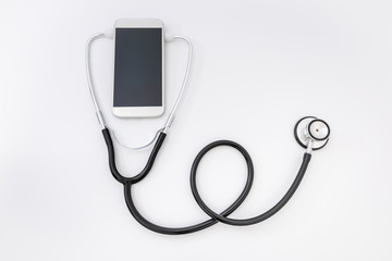 Fototapeta na wymiar Telemedicine. Smartphone and stethoscope, Health care, medicine, hospital