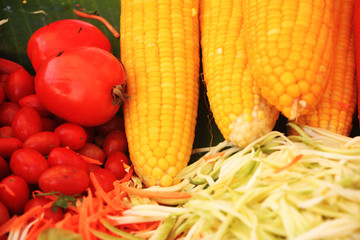 corn and vegetables in basket