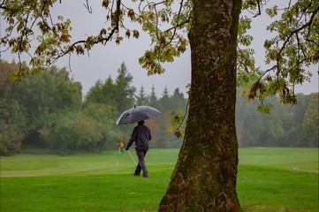 Golf under the rain