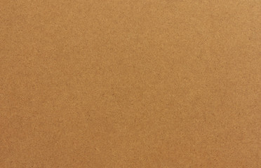 Brown drawing board texture background. Compressed particle board texture close up.