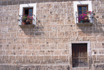 Wall with doors and balconies