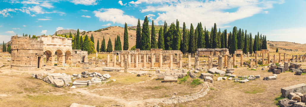 Panorama ancient Greco Roman city. Ruins of ancient city, Hierapolis in Pamukkale, Turkey. Ruined ancient place