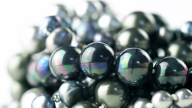 Black pearls rotating close up macro jewellery. 4K footage.