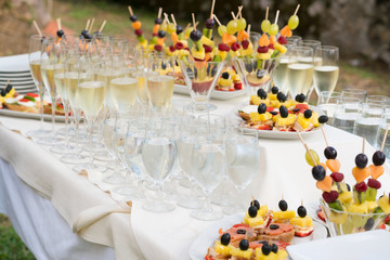 champagne glasses and various snacks for consumption after the wedding ceremony © bigguns