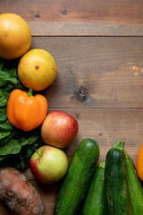 Fresh fruit and vegetables on wood table