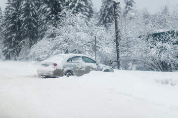 Fototapeta na wymiar Blizzard on the road. Heavy snowfall paralyzed traffic for several hours.