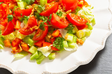 Salad plate on a slate plate