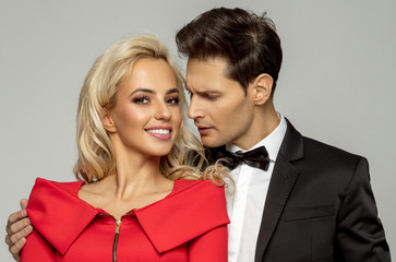 Beautiful loving couple wearing evening outfit
