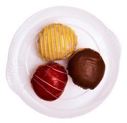 Three special jam doughnut filled with vanilla raspberry jelly, advocaat, chocolate on white background cutout, Baden Wuerttemberg, Germany, Europe
