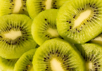 juicy bright green kiwi fruits with seeds