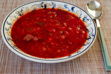 red soup in a plate