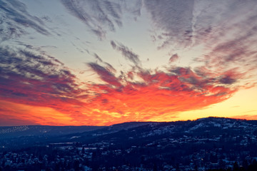 Fantastic orange red large sunset clouds