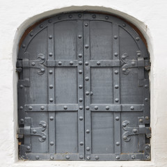 black ancient metallic door