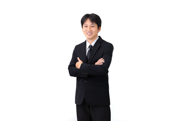 Obraz na płótnie Canvas Portrait of young Asian businessman on white background
