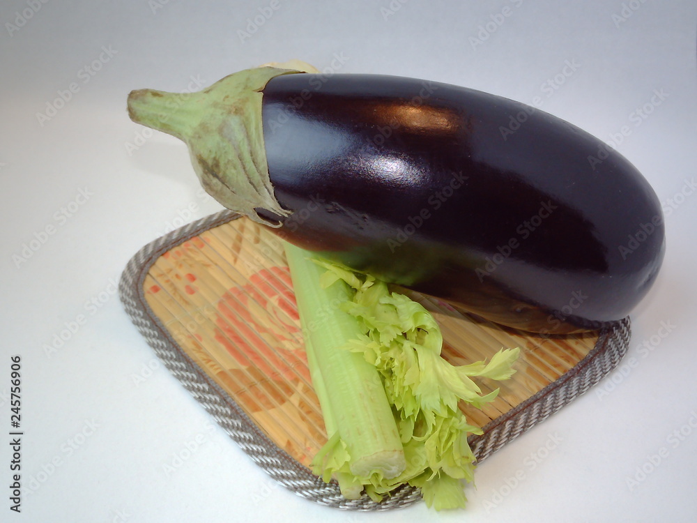 Wall mural eggplant and vegetables isolated on white background