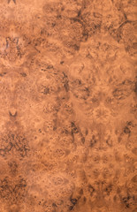 brown lacquered polished wooden surface