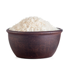 rice cereal in a brown clay plate, close-up, isolated on white background