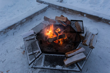 a fire burning in the polar night
