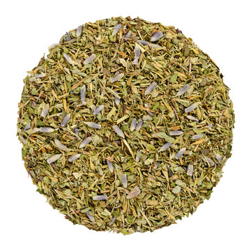 Dried Herbes de Provence, herb circle from above, isolated, over white. Disc, made of herbs of the Provence, France. Savory, rosemary, thyme, lavender, oregano and marjoram. Closeup. Macro food photo.