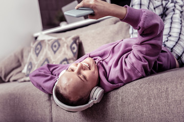 Charming young female person taking selfie photo