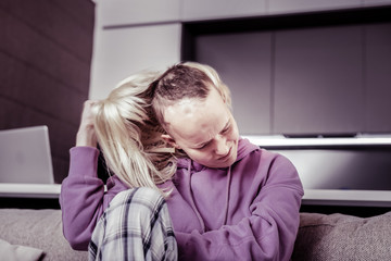 Sick young female person spending rehabilitation period
