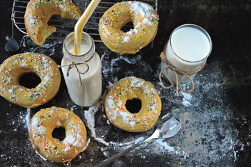 Fresh donuts with cream and milk