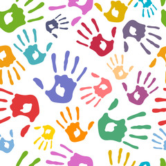 Obraz premium seamless pattern with colored palm prints on white background. vector.