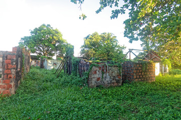 old ruined brick employees houses in La Poterie village, Les Trois-Ilets, Martinique FWI