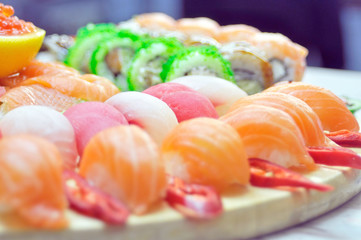 close up of sashimi sushi set with chopsticks and soy