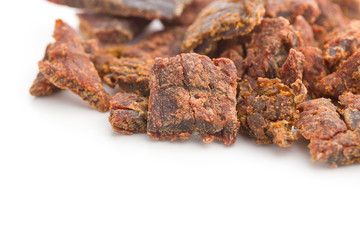Beef jerky pieces.