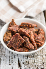 Beef jerky pieces.
